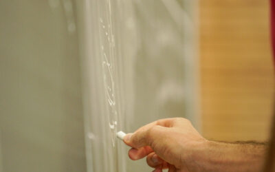 Higher gauge theory: a new bridge between algebraic geometry and theoretical physics